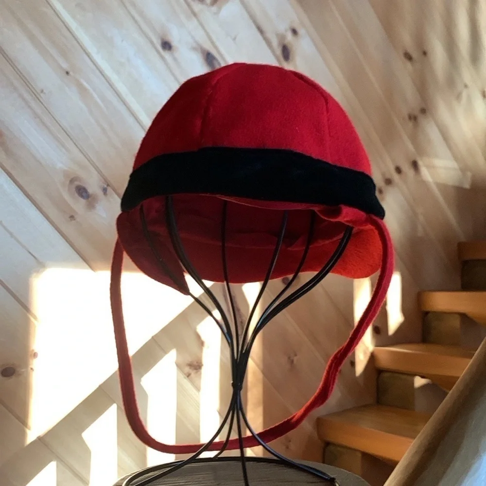 Kid’s dressy red trapper style hat with black velvet trim